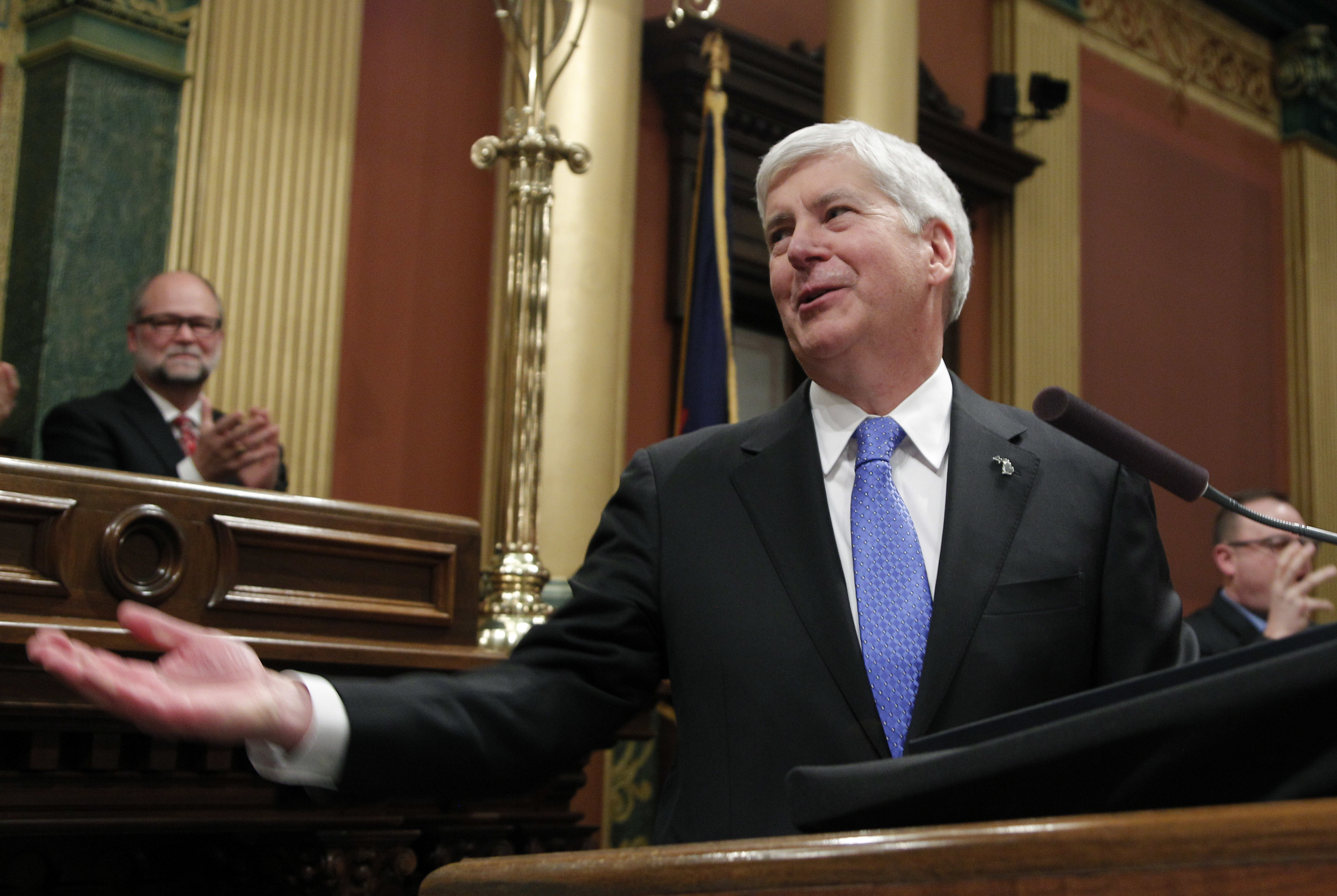 Michigan governor signs bills to gut wage, sick time laws