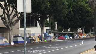 Protesters set up camp in front of LA Detention Center