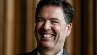 James Comey laughing