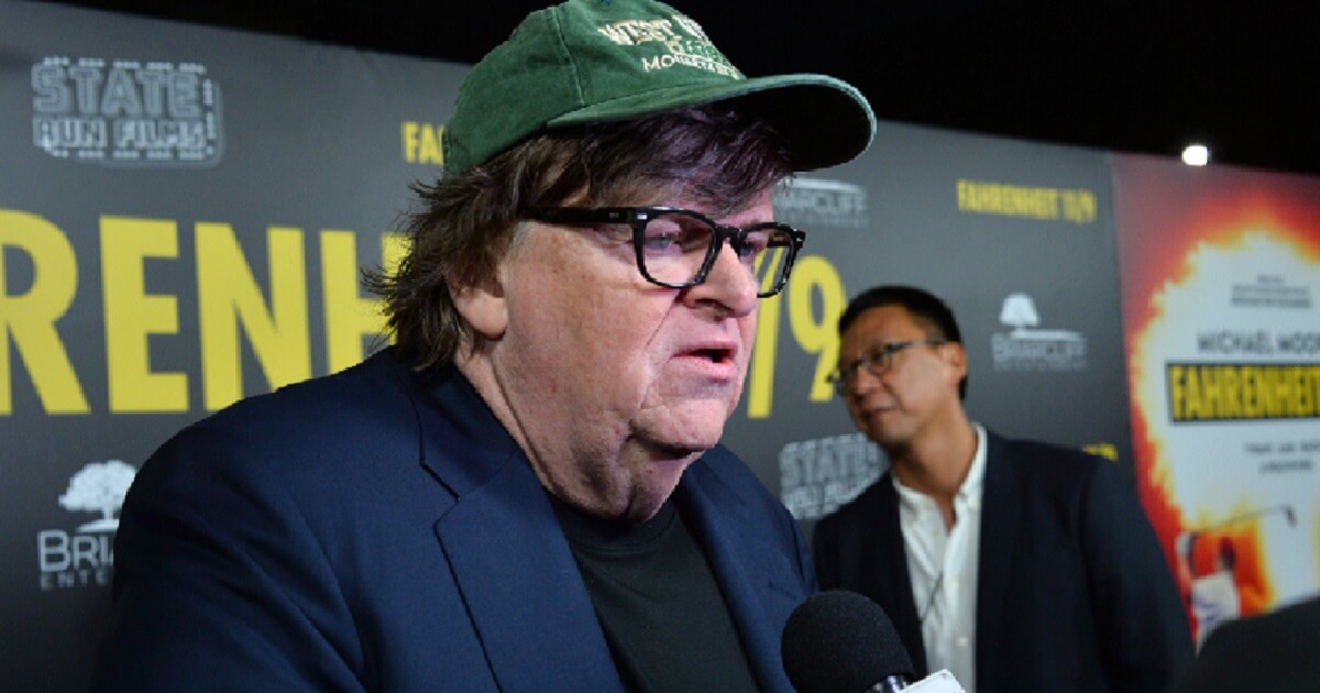 Michael Moore being interviewed.