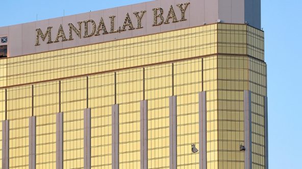 Broken windows are seen on the 32nd floor of the Mandalay Bay Resort and Casino after a lone gunman opened fire on the Route 91 Harvest country music festival on Oct. 2, 2017, in Las Vegas, Nevada. v