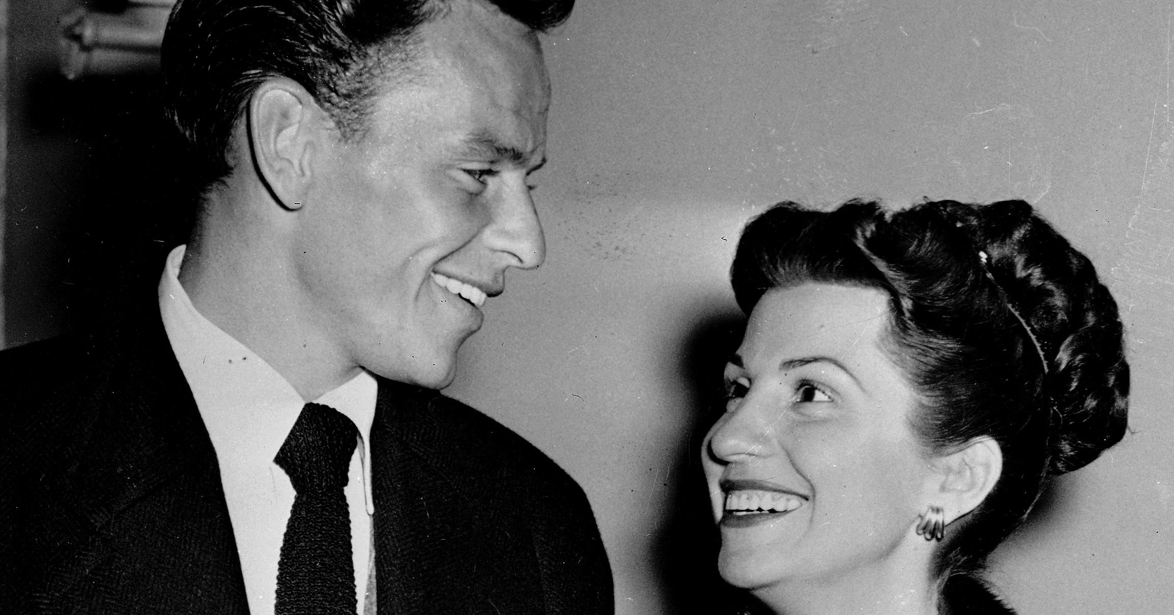 In this Oct. 23, 1946 file photo, singer Frank Sinatra and his wife Nancy smile broadly as they leave a Hollywood night club following a surprise meeting. Nancy Sinatra Sr., the childhood sweetheart of Frank Sinatra who became the first of his four wives and the mother of his three children, has died. She was 101. Her daughter, Nancy Sinatra Jr., tweeted that her mother died Friday, July 13, 2018.