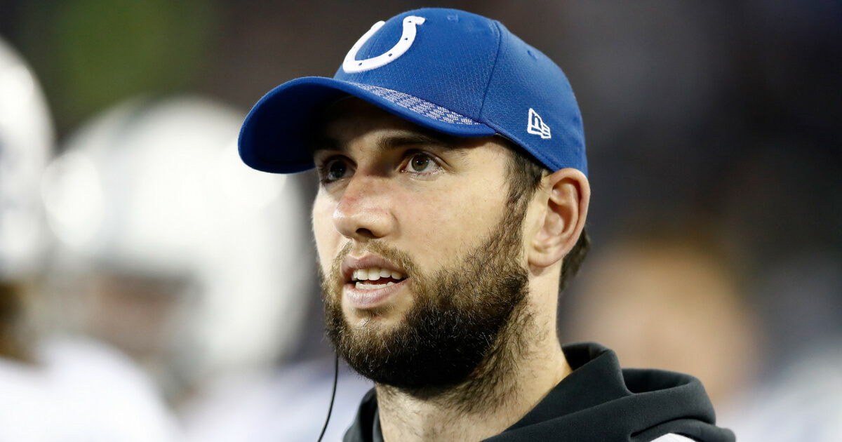 Andrew Luck #12 of the Indianapolis Colts watches from the bench during the game against the Tennessee Titans at Nissan Stadium on October 16, 2017 in Nashville, Tennessee.