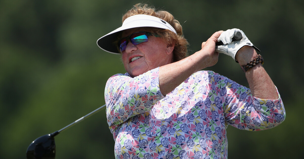 JoAnne Carner plays a tee shot on the 11th hole during the second round of the U.S. Senior Women's Open at Chicago Golf Club on July 13, 2018 in Wheaton, Illinois.