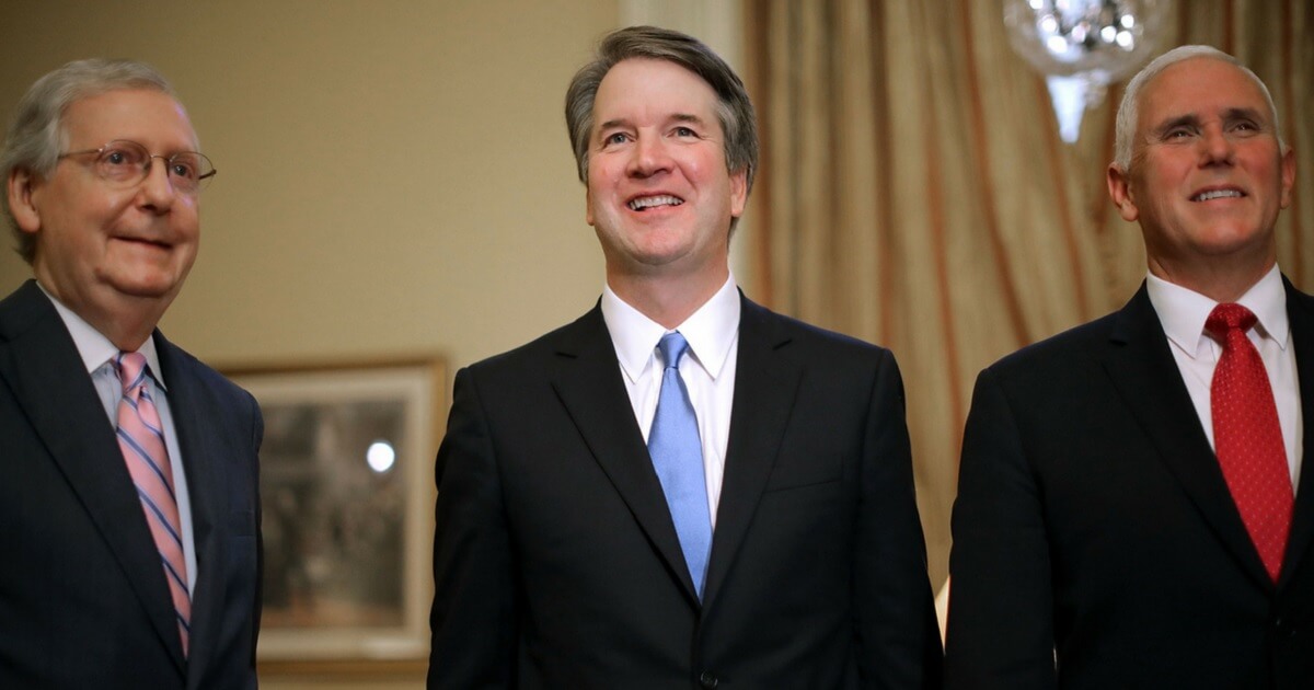 Supreme Court nominee Brett Kavanaugh, center, with Senate Majority Leader Mitch McConnell, left, and Vice President Mike Pence in McConnell's office on July 10, 2018.
