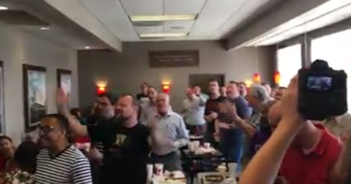 Pastors sing in a chick fil a