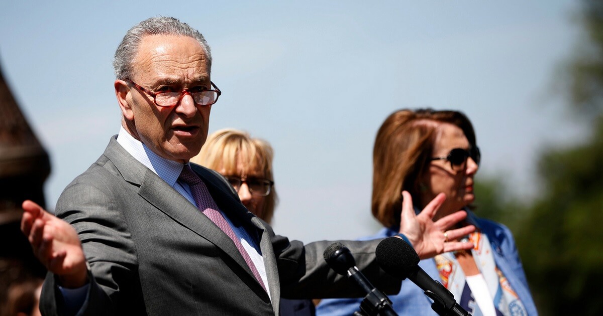 Senate Minority Leader Chuck Schumer and House Minority Leader Nancy Pelosi speaks with reporters outside the U.S. Capitol on June 26, 2018 in Washington.