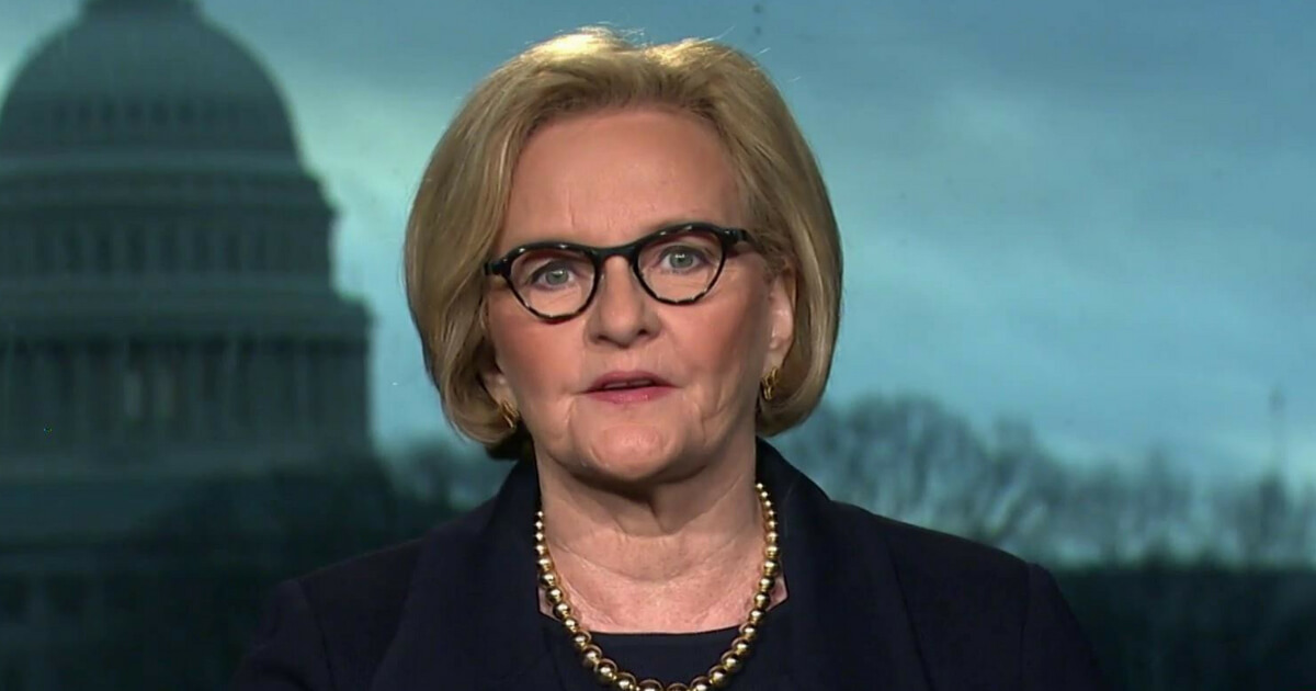 U.S. Sen. Claire McCaskill speaks into a hand-held microphone during a 2015 conference in New York City.