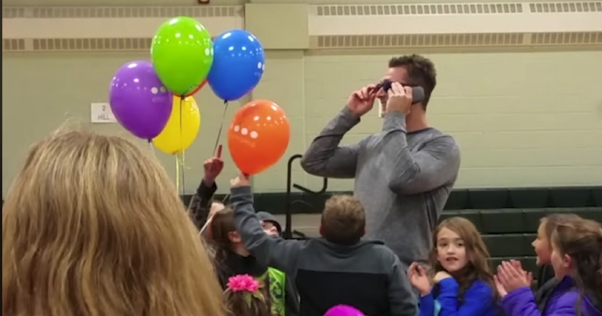 An elementary school teacher receives a gift from his students and gets to see color for the first time.