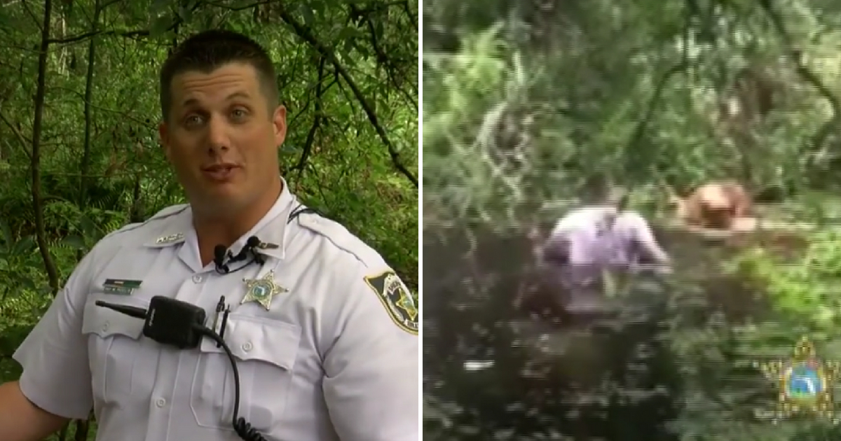 Cop Rescues Dog in Swamp