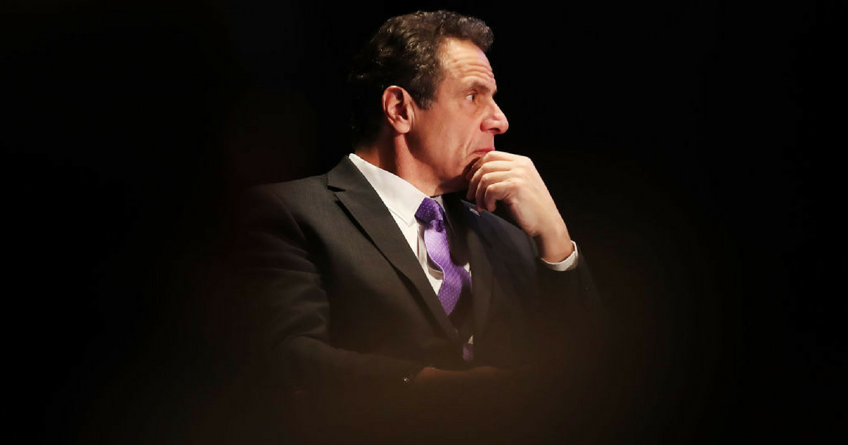 New York Governor Andrew Cuomo watches as former Vice President Al Gore speaks at an event at New York University, denouncing the Trump administration's proposal to open up new areas to offshore drilling, on March 9, 2018 in New York City.