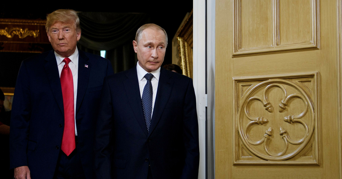 US President Donald Trump (L) and Russian President Vladimir Putin arrive for a meeting in Helsinki, on July 16, 2018.
