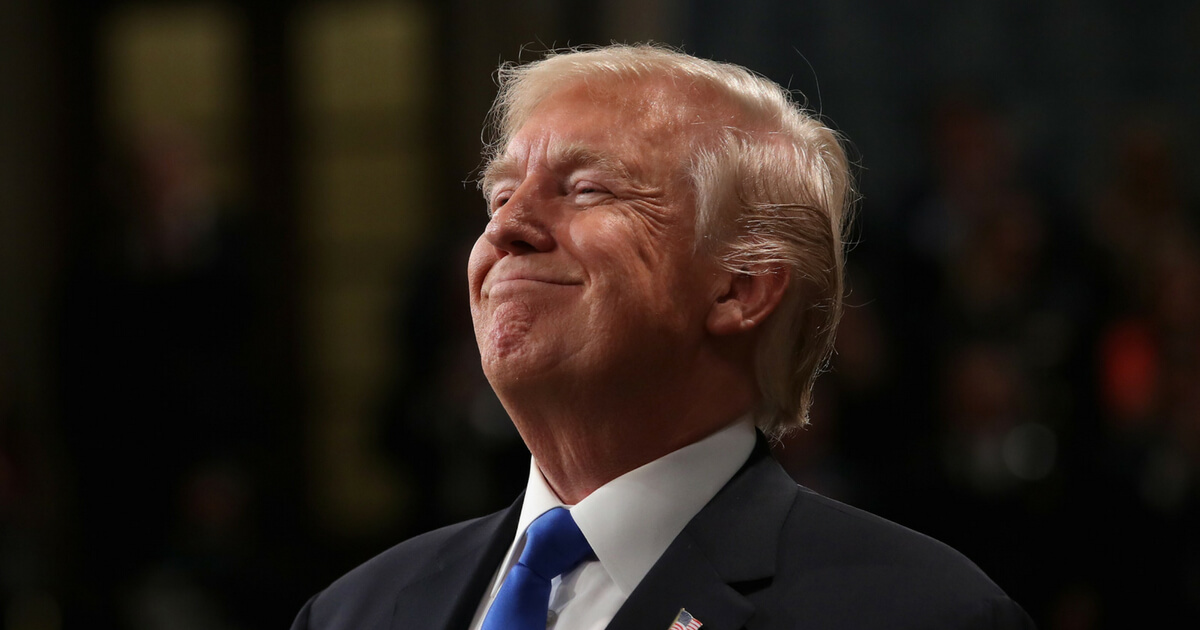 Donald Trump smiles during the State of the Union address