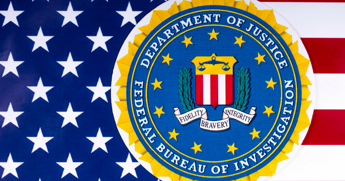 FBI logo with an American flag in the background.