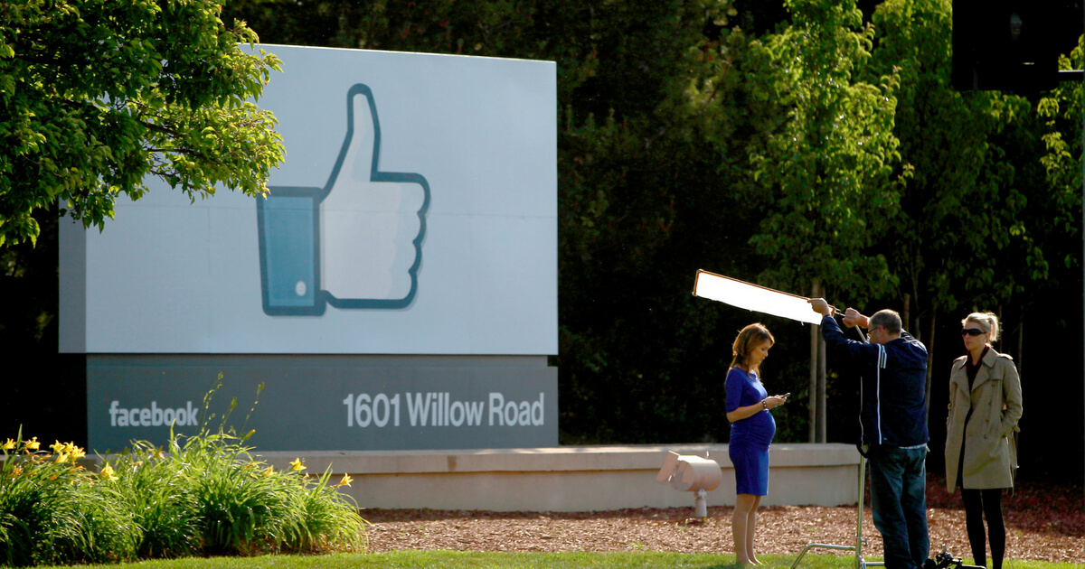 A television crew prepares for a broadcast in front of a 'like' sign outside Facebook headquarters May 18, 2012 in Menlo Park, California.
