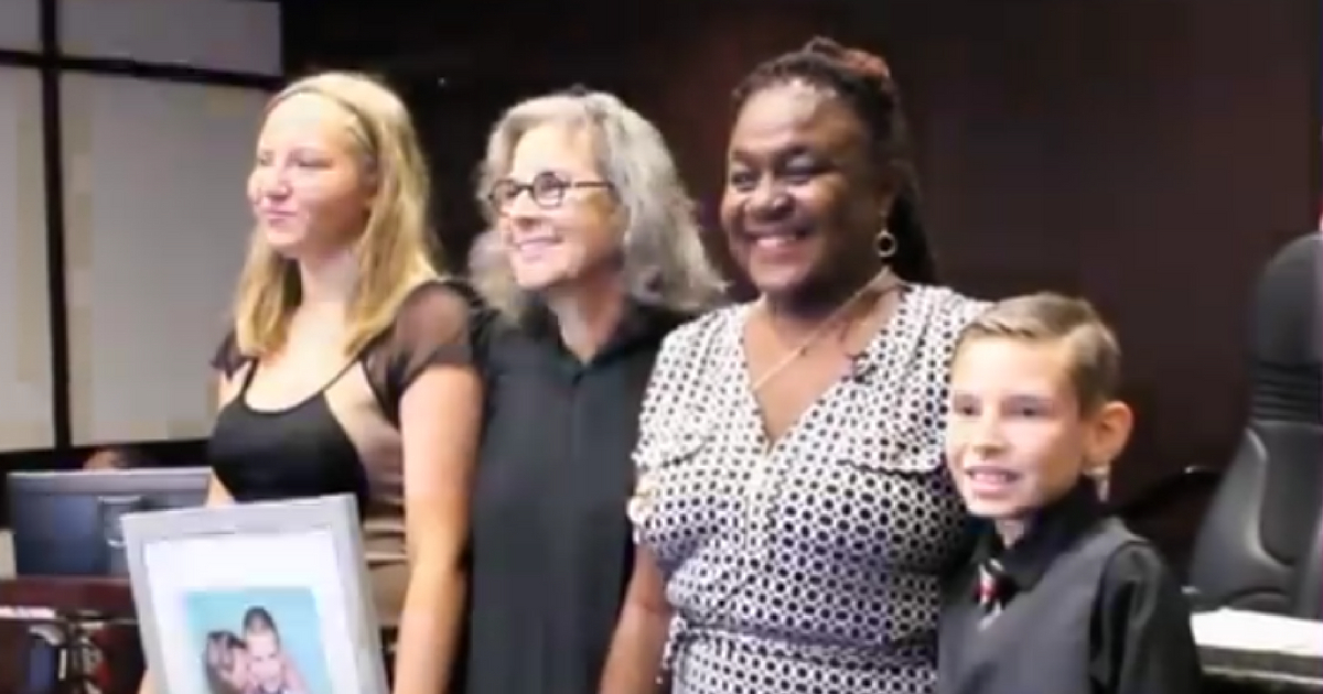 Francis Martin was overjoyed as she officially adopted her foster children, Christopher and Chasity.