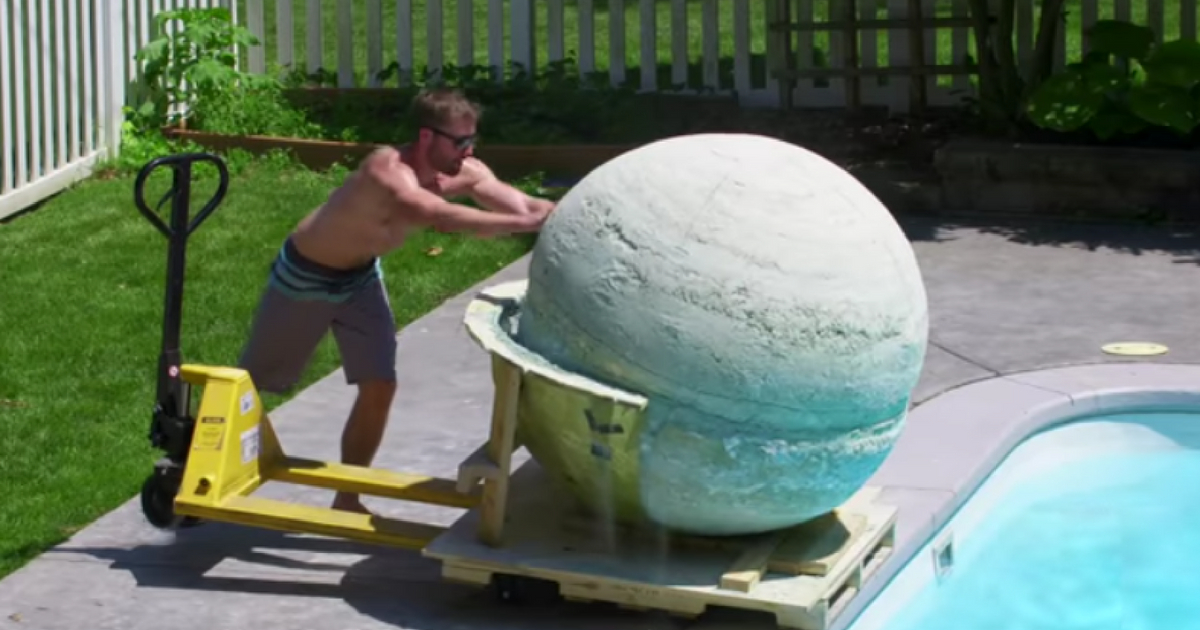 A group decided to make the world's largest bath bomb, weighing 2,000 pounds, and roll it into their swimming pool.