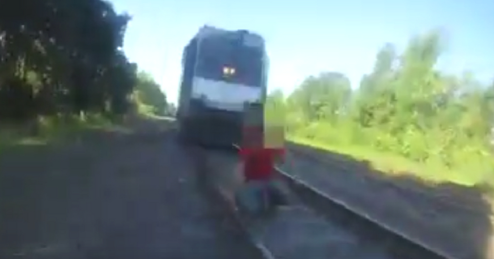 A police officer saved a man from being hit by a train.