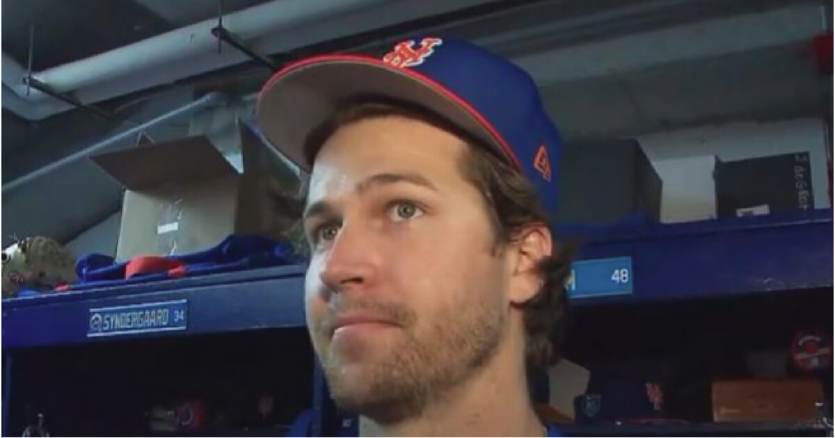 Mets pitcher Jacob deGrom talks to reporters