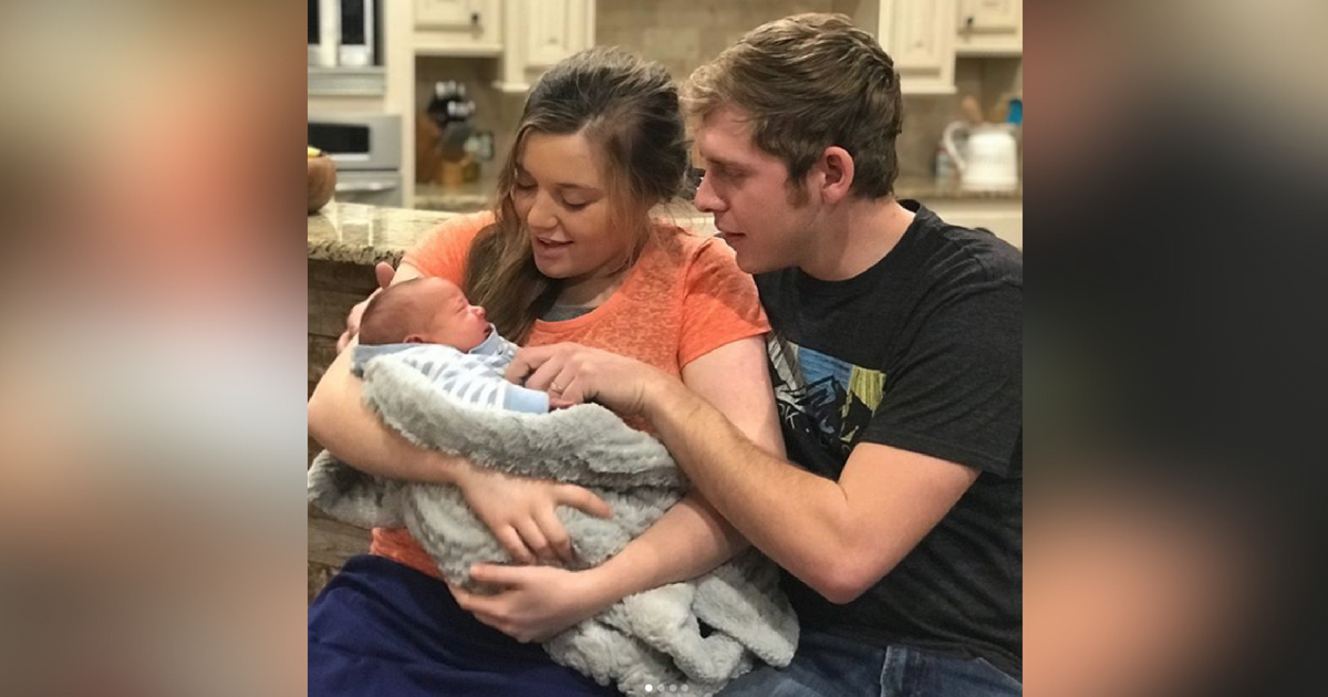 Austin and Joy with their son Gideon.