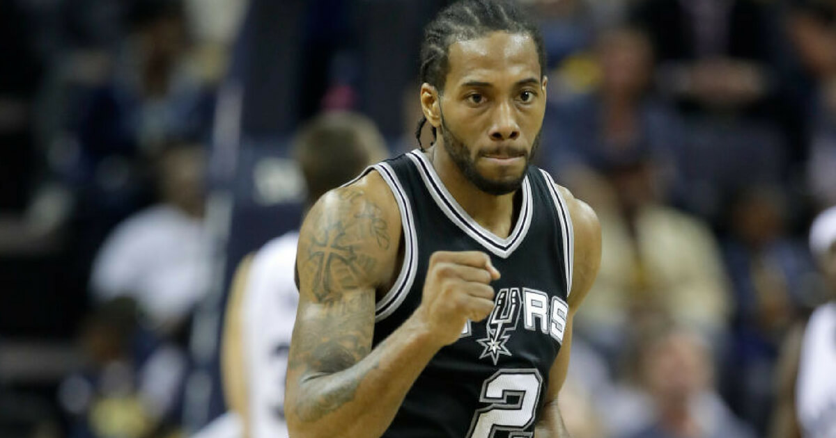 Kawhi Leonard reacts with a fist pump during the 2017 NBA Playoffs as a member of the San Antonio Spurs