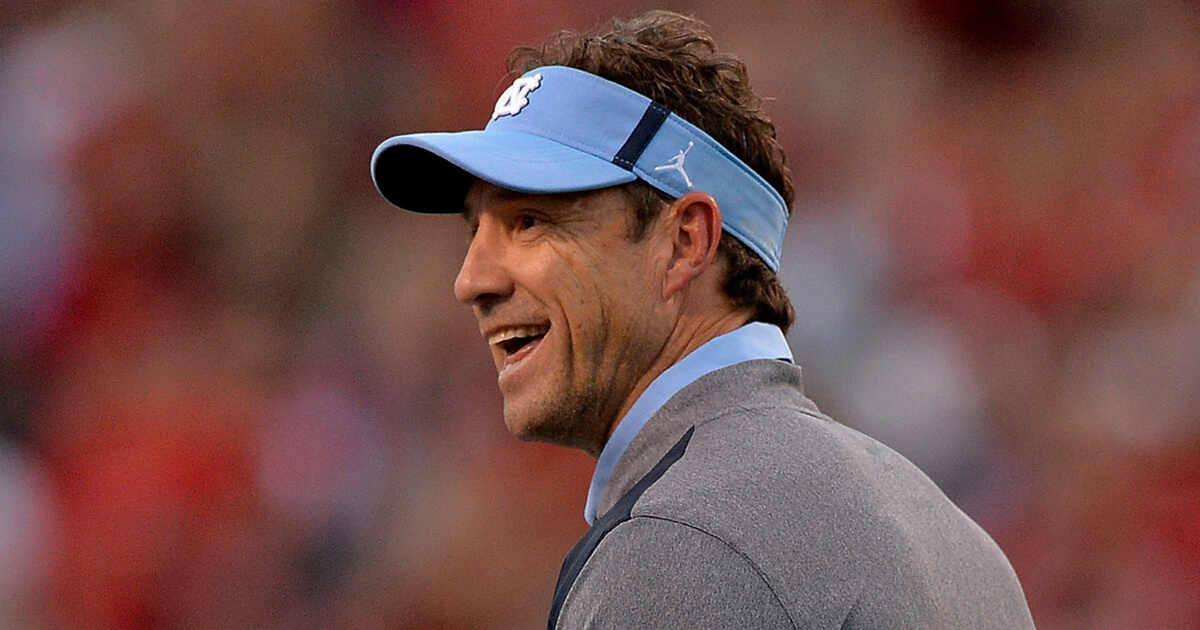 Head coach Larry Fedora of the North Carolina Tar Heels watches his team during their game against the North Carolina State Wolfpack at Carter Finley Stadium on November 25, 2017 in Raleigh, North Carolina.