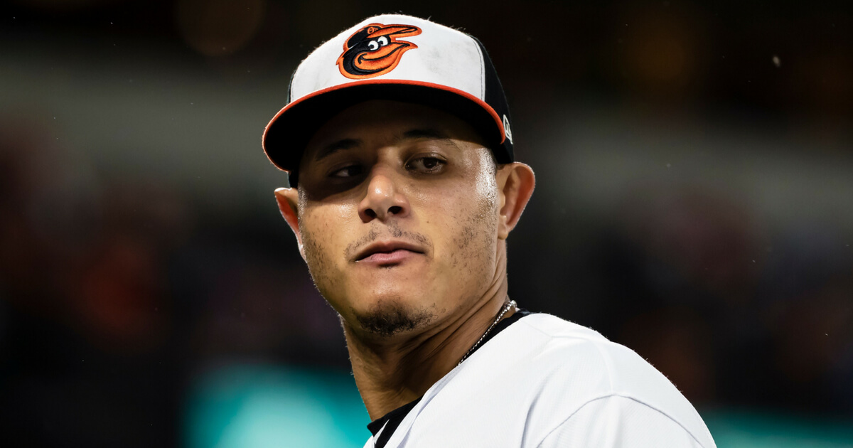 Manny Machado #13 of the Baltimore Orioles looks on against the Washington Nationals during the fifth inning at Oriole Park at Camden Yards on May 30, 2018 in Baltimore, Maryland.