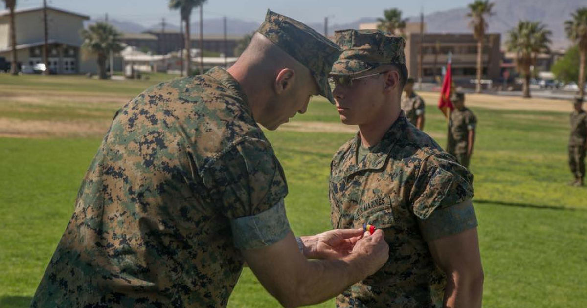 A marine received the highest honor for bravery after risking his own life to save a drowning boy in the Salt River.
