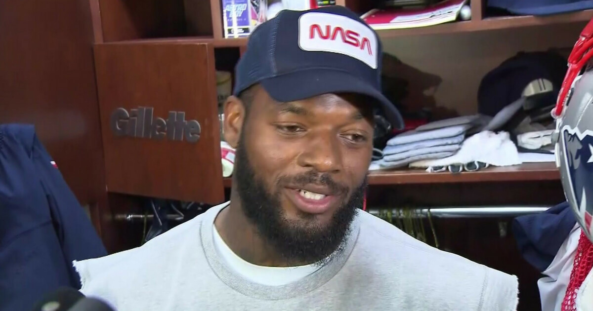Martellus Bennett speaks to reporters as a member of the New England Patriots