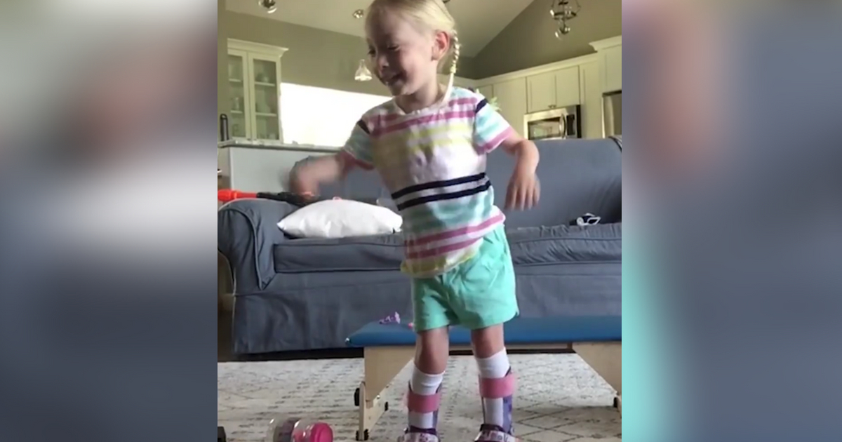 Maya takes her first steps after surgery.
