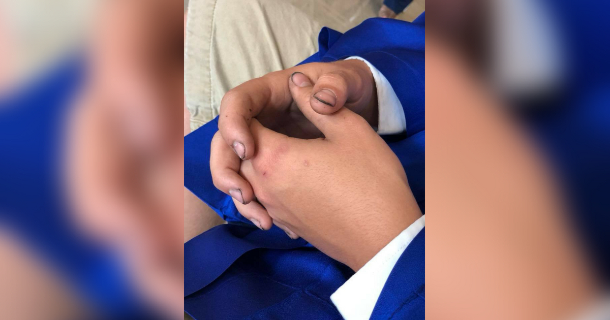 A mother sees her son's dirty hands for senior pictures, realizing that she had taught him to power of hard work.