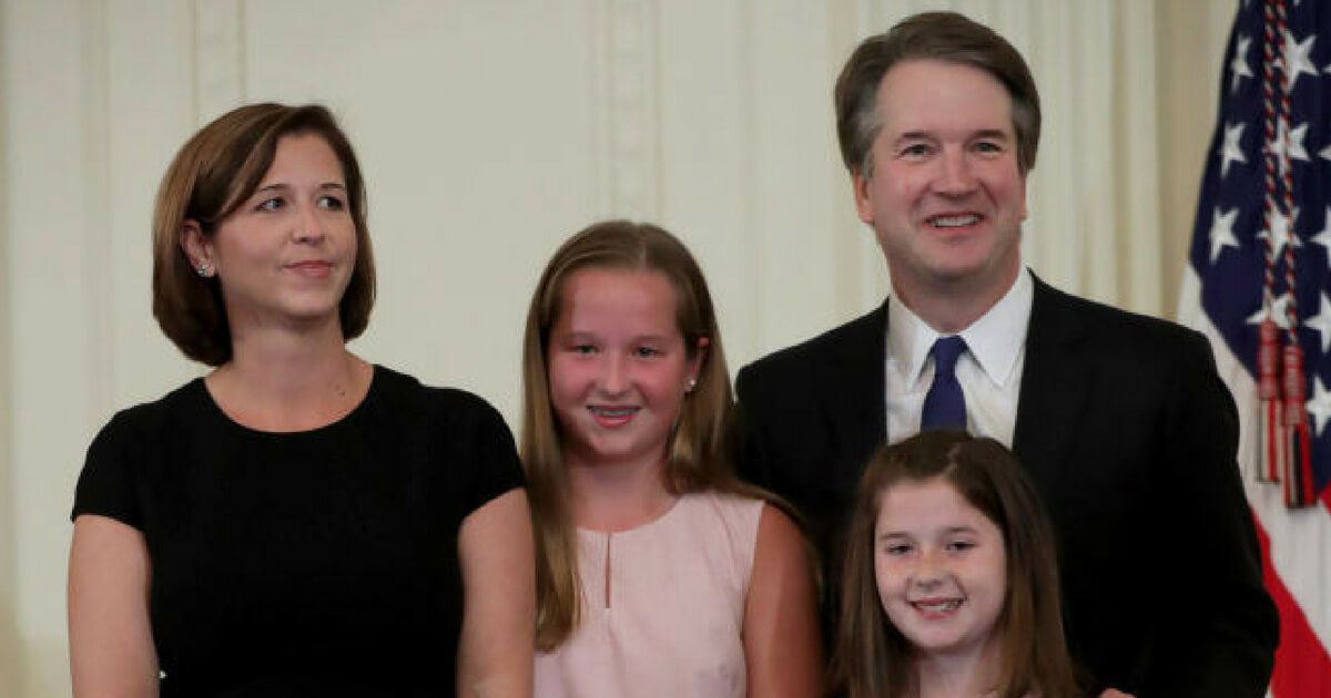 U.S. Circuit Judge Brett M. Kavanaugh stands with his family as President Donald Trump introduces him as his nominee to the United States Supreme Court during an event in the East Room of the White House July 9, 2018 in Washington, DC. Pending confirmation by the U.S. Senate, Judge Kavanaugh would succeed Associate Justice Anthony Kennedy, 81, who is retiring after 30 years of service on the high court.