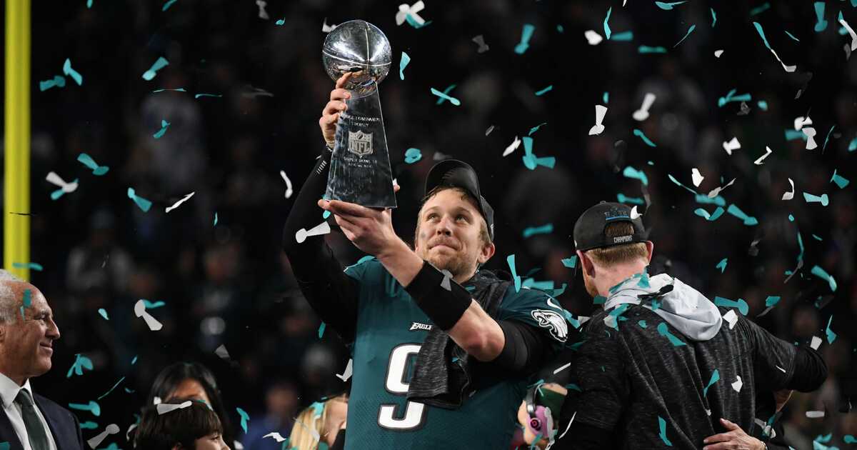 Quarterback Nick Foles of the Philadelphia Eagles celebrates following victory over the New England Patriots in Super Bowl LII at US Bank Stadium in Minneapolis, Minnesota, on February 4, 2018. The Philadelphia Eagles scored a stunning 41-33 upset victory over the New England Patriots to win their first ever Super Bowl after a costly Tom Brady fumble ended the quarterback's tilt at history.