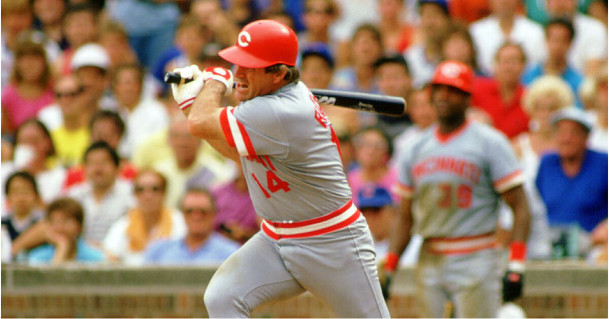 Pete Rose of the Cincinnati Reds swings at a pitch in a 1986 game against the Cubs in Chicago