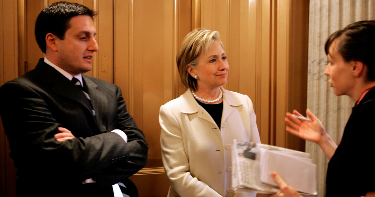 Secretary of State-designate and U.S. Senator Hillary Clinton (D-NY) refuses to take questions while waiting for an elevator with her press secretary Philippe Reines at the U.S. Capitol January 7, 2009 in Washington, DC.