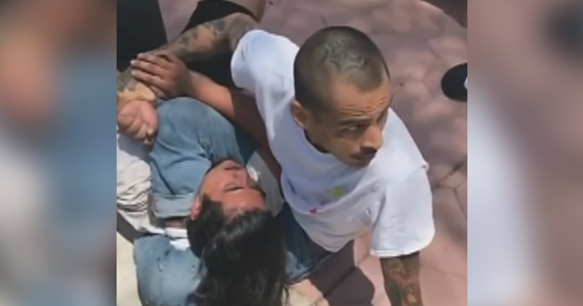 Sergio Hernandez Jr. holds thief in a choke hold.