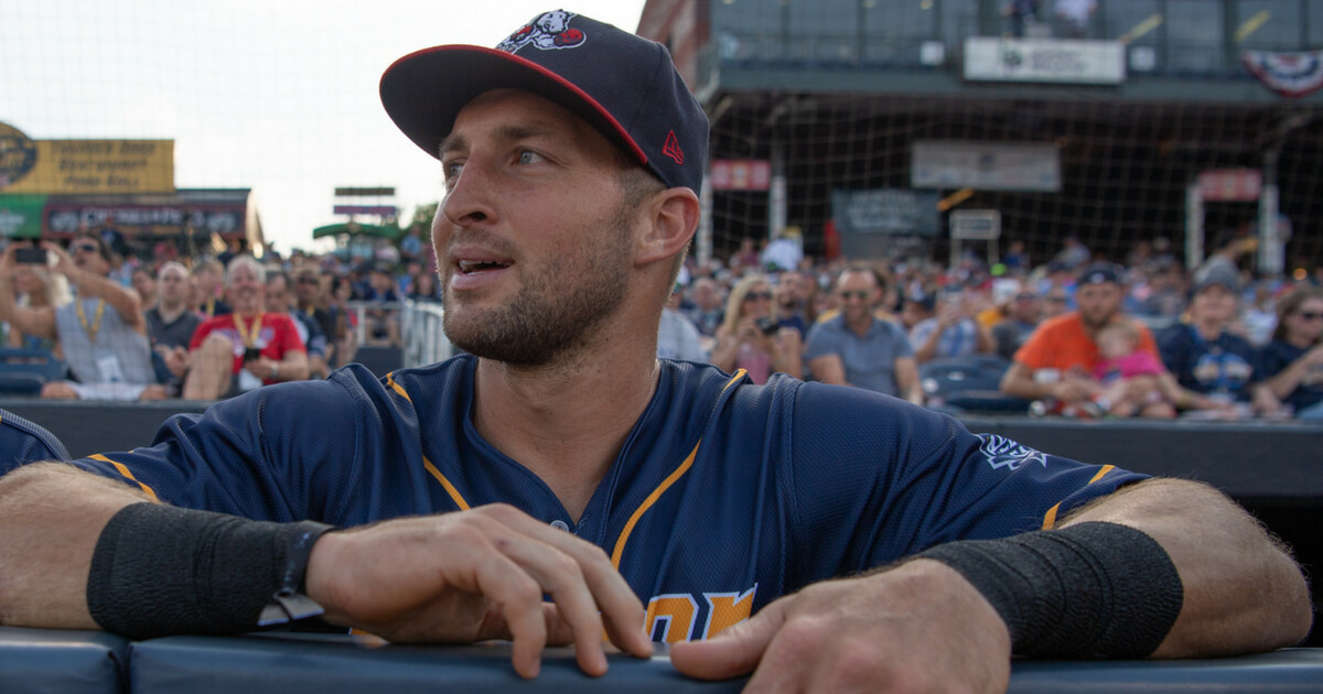 Tim Tebow #15 of the Eastern Division All-Stars in the dugout with teammates during the 2018 Eastern League All Star Game at Arm & Hammer Park on July 11, 2018 in Trenton, New Jersey.