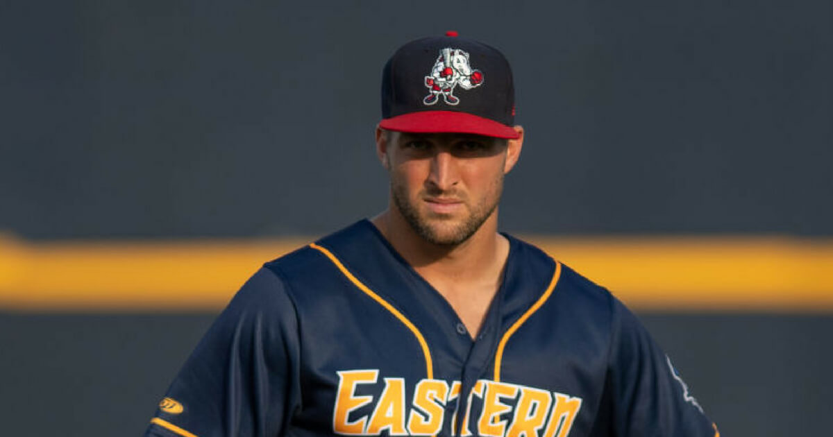 Tim Tebow warms up before the 2018 Eastern League All-Star Game.