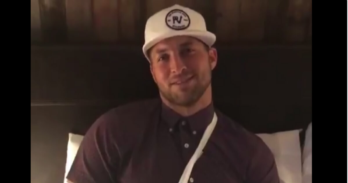 Tim Tebow speaks to fans in a Twitter video following his recent hand surgery