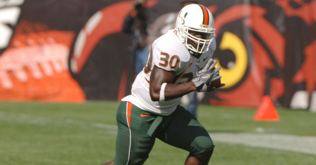 University of Miami running back Tyrone Moss rushes across midfield against Temple at Lincoln Financial Field, October 15, 2005, in Philadelphia. The Hurricanes defeated the Owls 34 - 3.