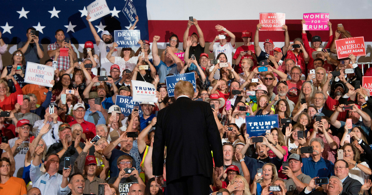 Supporters cheer as U.S. President Donald Trump arrives to speak during a 'Make America Great again' rally in Great Falls, Montana, on July 5, 2018.