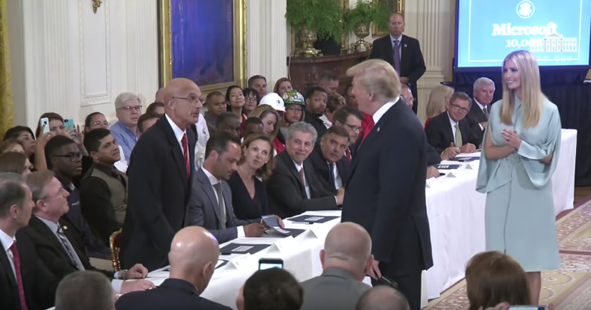 A Marine puts down his mic and tells President Trump that he is working with some good people.