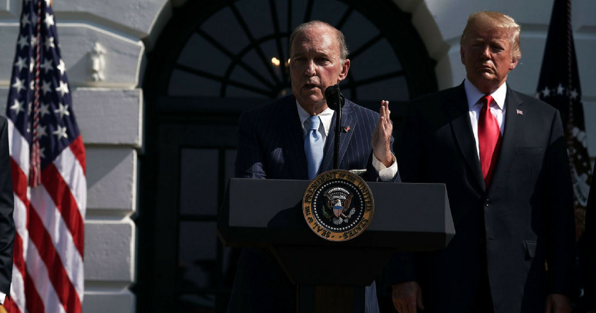 Director of the United States National Economic Council Larry Kudlow (L) speaks after U.S. President Donald Trump (R) made remarks on economy July 27, 2018 at the South Lawn of the White House in Washington, DC.