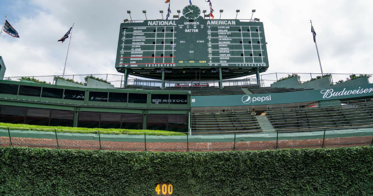 The famous ivy covered walls and center field scoreboard at Wrigley Field