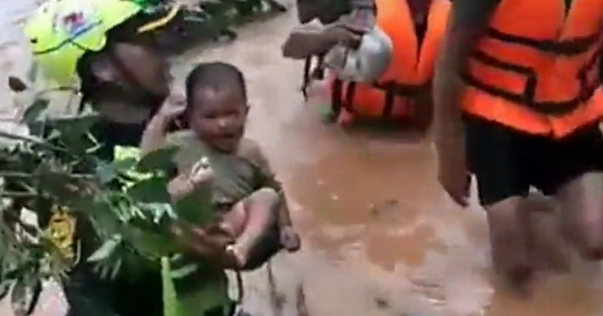 A 4-month-old baby was rescued in Laos after being stranded for four days.