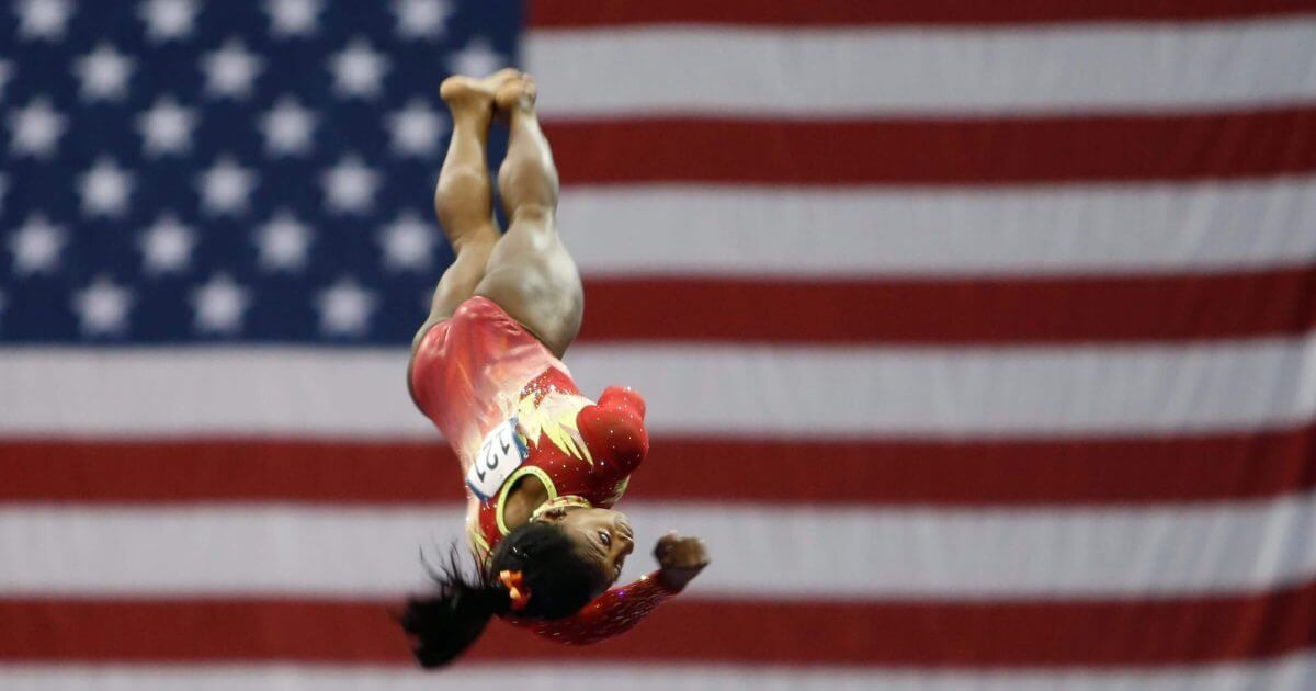 Olympic champion Simone Biles competes on the vault during the U.S. Classic gymnastics competition