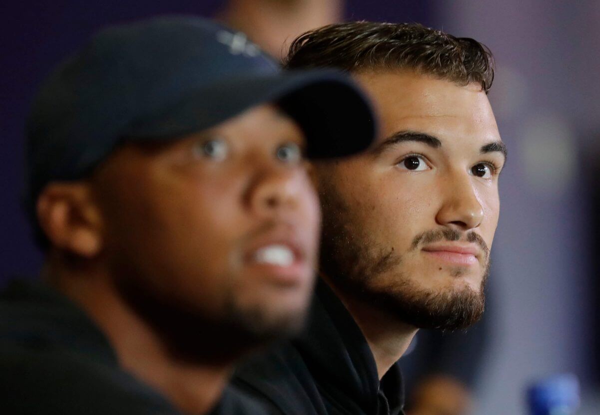 Chicago Bears quarterback Mitchell Trubisky, right, listens to a question at a news conference during an NFL football training camp in Bourbonnais, Ill., Thursday, July 19, 2018.
