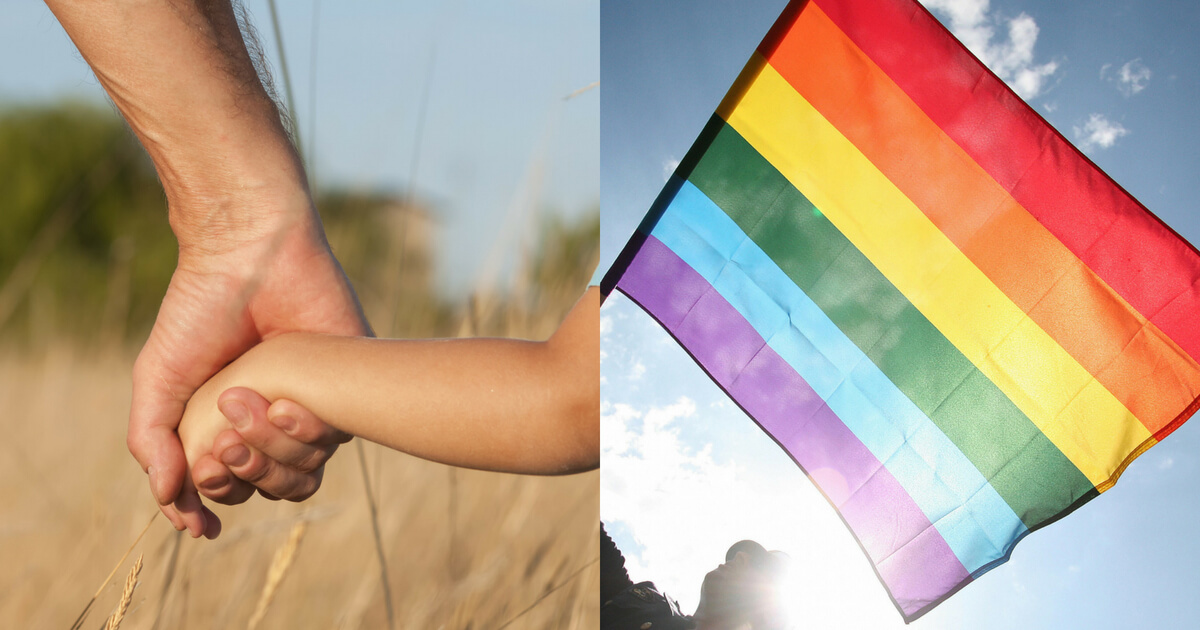 holding hands and someone waving rainbow flag