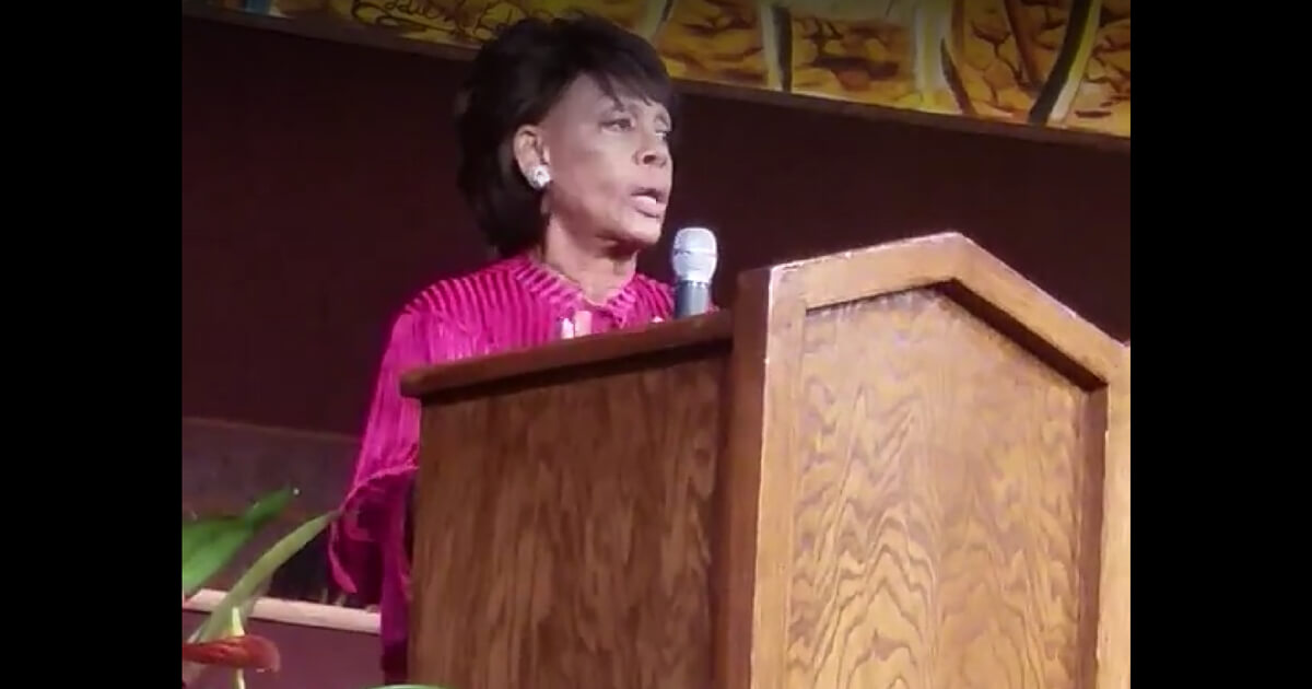Maxine Waters speaking at church podium