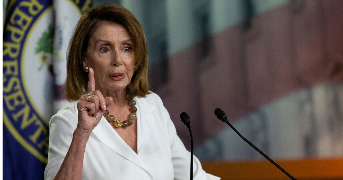 House Minority Leader Nancy Pelosi (D-CA) speaks from the podium during her weekly press conferenc